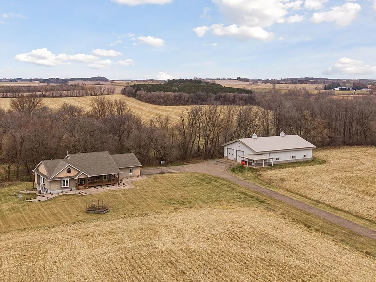 Elegant 4-Bedroom Farmhouse on 11.6 Acres