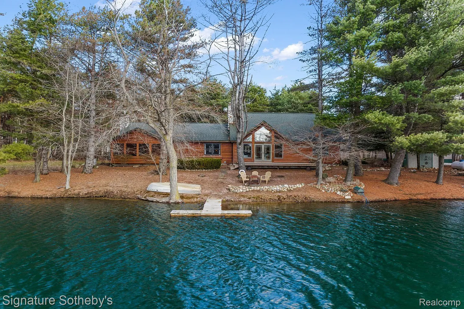 Private Log Home Retreat with 40 Acres and Private Lake in Harbor Beach, MI
