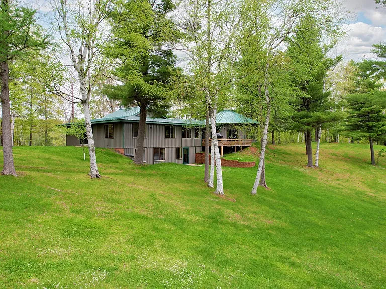 Private 345-Acre Lakefront Estate with 4-Bedroom Home, Sauna, Trails & Pole Building