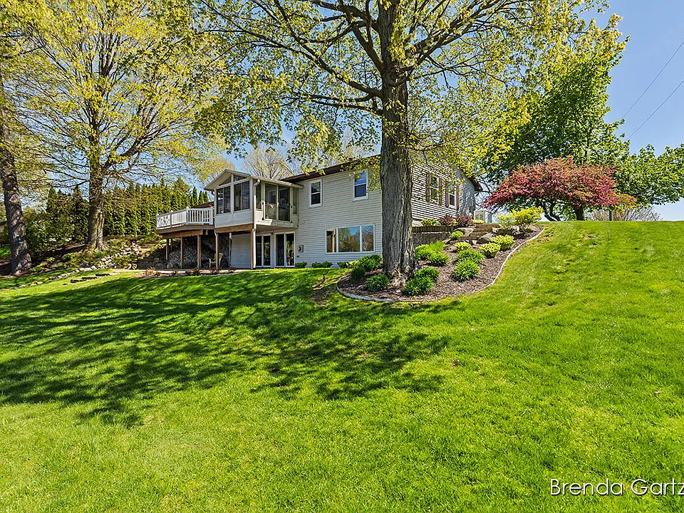 Stunning Executive Ranch with 240+ Feet of Private Lakefront on a Peaceful 5-Acre Lake