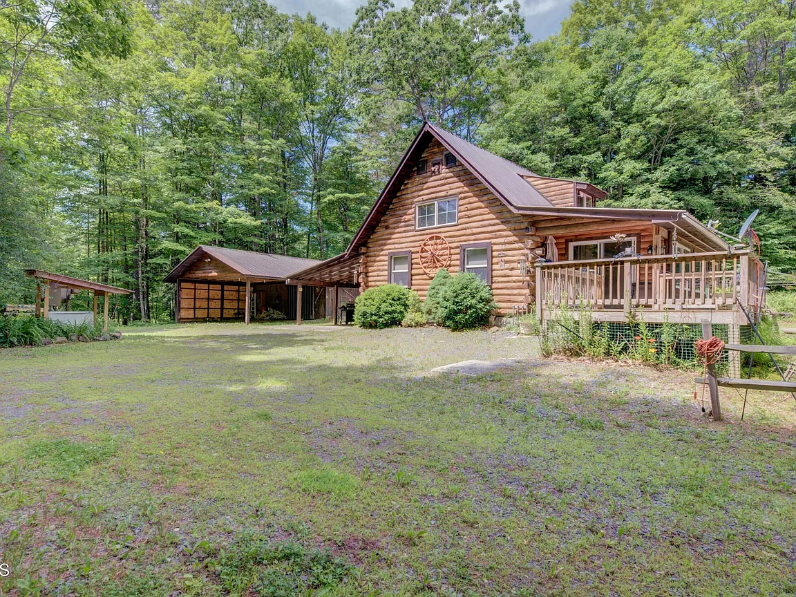 Rustic Adirondack Log Cabin on 70 Private Acres – A Year-Round Retreat