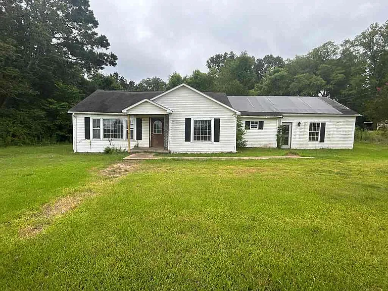 Rural Opportunity: 4-Bedroom Home on 2 Acres Under $50K