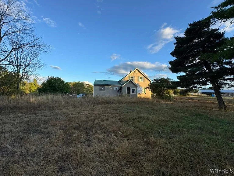 Spacious Fixer-Upper with Investment Potential on a Private Lot