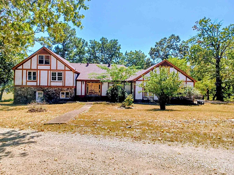 Historic Tudor-Style Fixer-Upper on 5.5 Acres of Natural Beauty