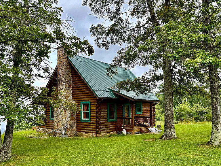 Secluded Mountain Cabin Retreat on 271 Acres with Income