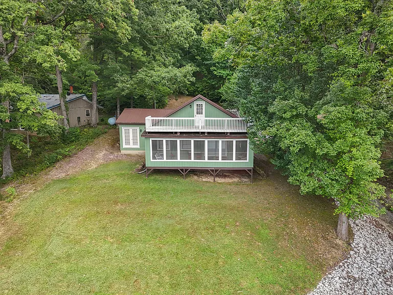 Living the Dream on Sid Calk Lake – Yours for Just $199,000