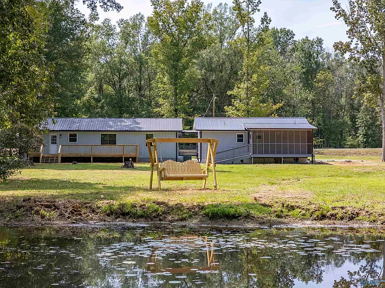 Tranquil Country Living with Two Homes on Spacious Acreage