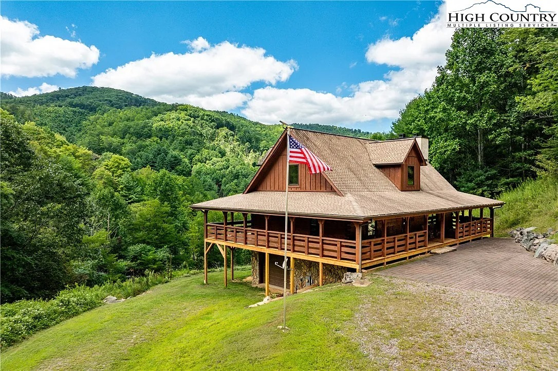 Secluded 44-Acre Mountain Retreat with Custom Log Cabin and Creek Frontage