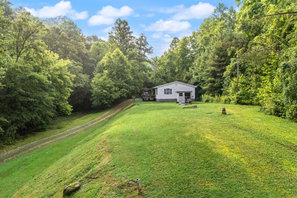Scenic 55-Acre Property with Home Just Minutes from Booneville