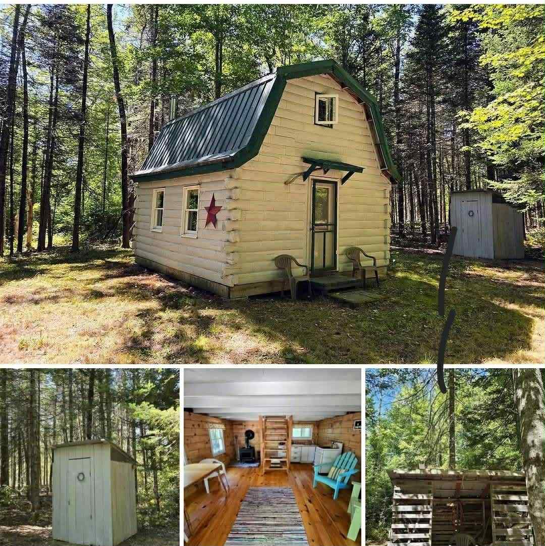Peaceful Two-Story Log Cabin Retreat Nestled on 2.2 Wooded Acres