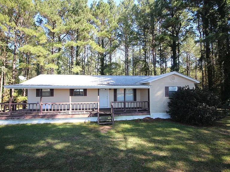 Secluded Country Home on 14.5 Acres with Pines and Privacy
