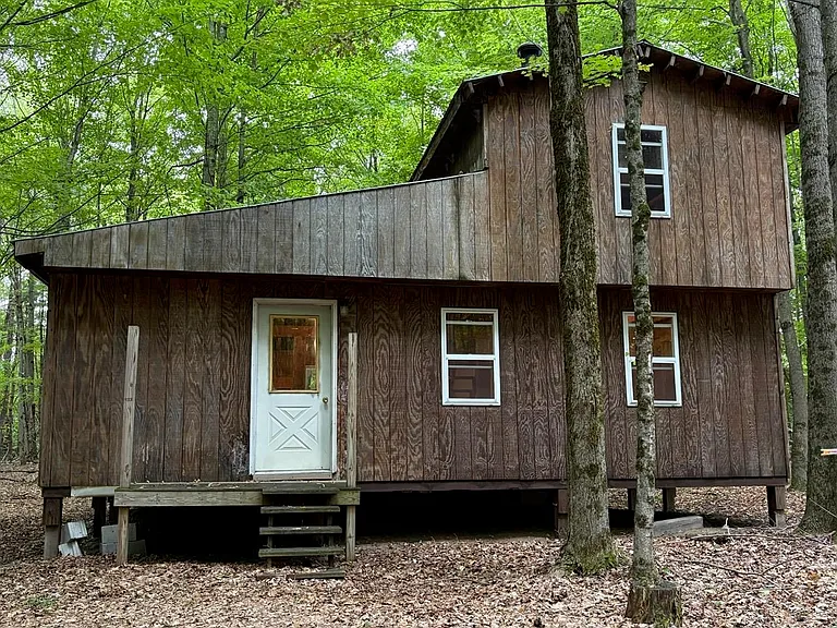 Secluded Riverside Cabin on 10+ Wooded Acres in Potsdam, NY