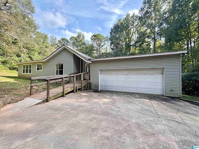 Spacious Sylacauga Property with Classic Structure and Renovation Potential