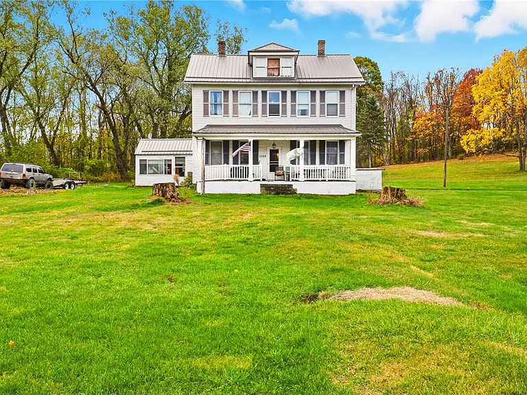 Charming Farmhouse-Style Home on Spacious Lot with Modern Comforts in Johnstown
