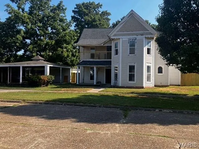 Classic Two-Level House with Large Yard and Endless Upgrade Opportunities