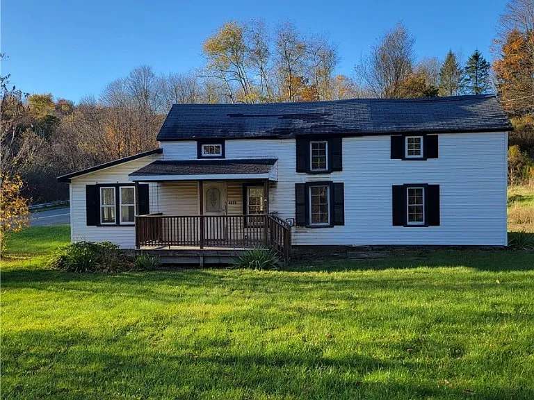 Charming Country Home with Acreage and Endless Potential in Cortland, New York