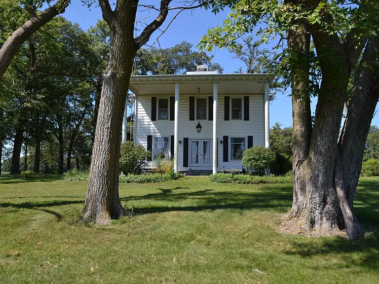 Spacious Rural Retreat with Extensive Land and Endless Potential