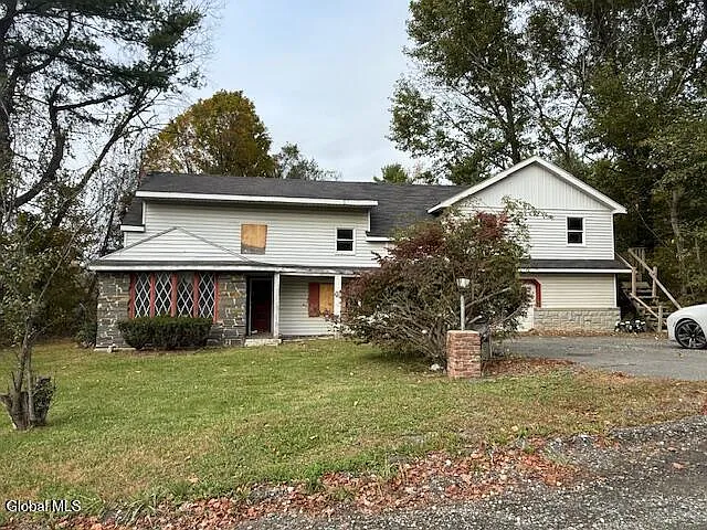 Charming Country Home in Scenic Troy with Endless Potential