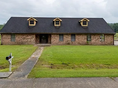Spacious Two-Story Home on One Acre with Renovation Potential in Gray, LA