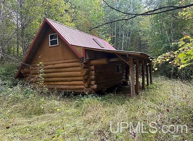Secluded Log Cabin Retreat on Over One Hundred Acres in Ottawa National Forest