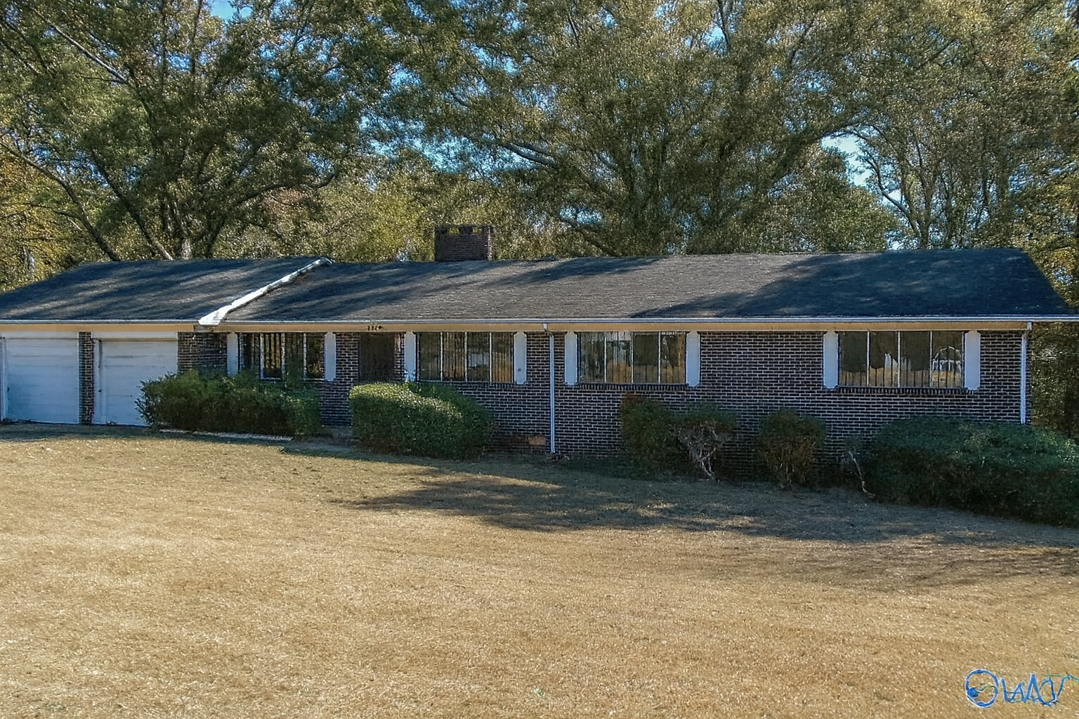 Brick Home With Solid Structure and Great Potential in a Quiet Anniston Neighborhood