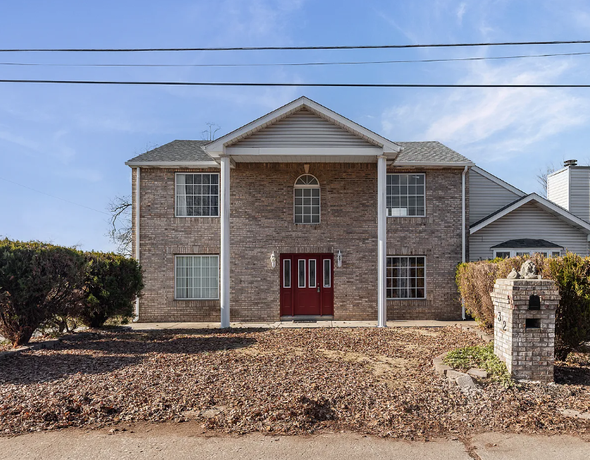 Spacious Multi-Level Home with Finished Basement and Sunroom in East Saint Louis”
