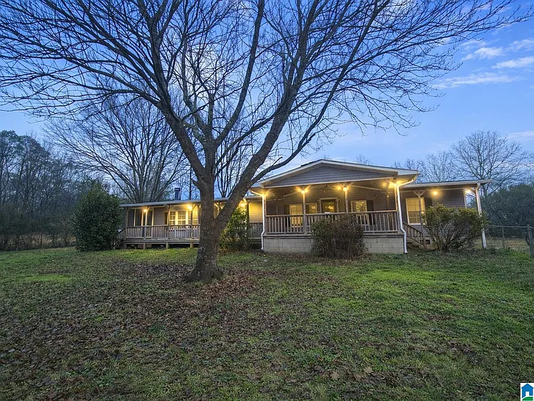 Established Dora Home with Flexible Outdoor Space and Natural Setting