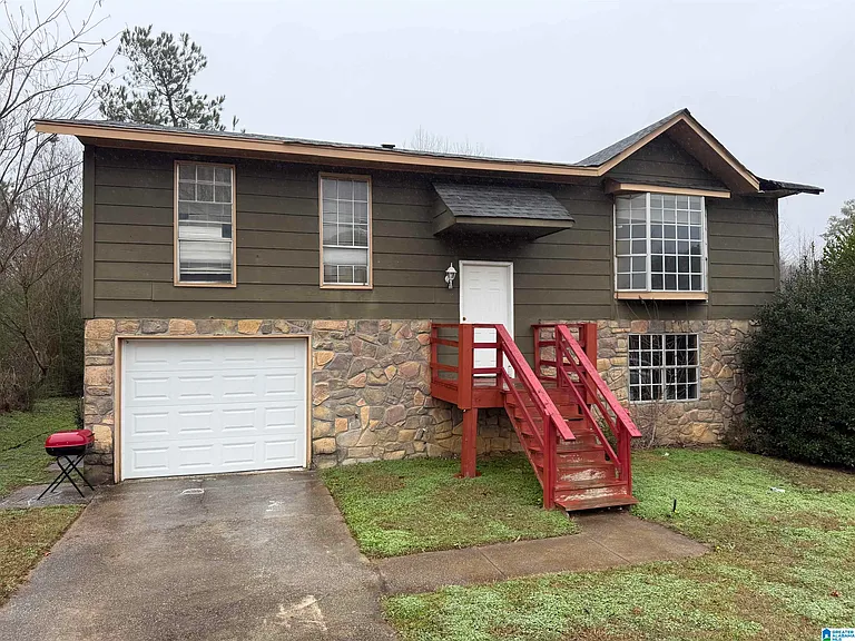 Convenient Birmingham Location with Cozy Home & Backyard Potential
