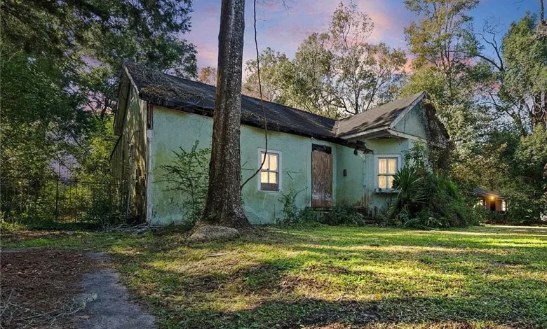 Investment Opportunity on Nearly One Acre – Sold As Is