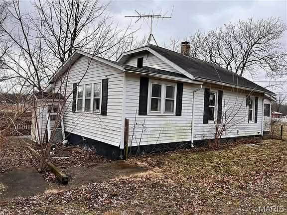 Charming Two-Bedroom Fixer-Upper on a Spacious In-Town Lot