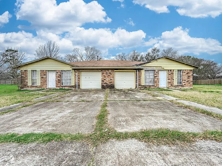 Investment Duplex Opportunity with Strong Renovation Potential