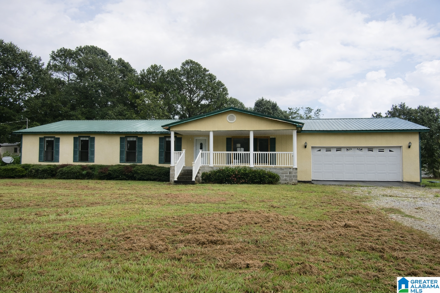 Spacious One Level Home with Large Yard and Great Potential in Peaceful Sylacauga Setting