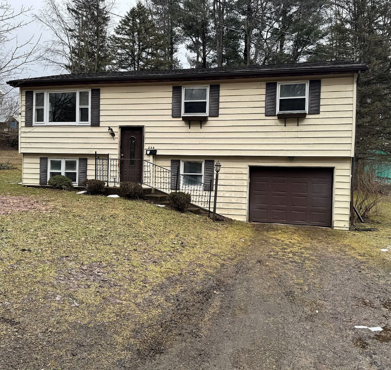 Charming Split-Level Home with Spacious Yard and Great Potential in Corry, Pennsylvania