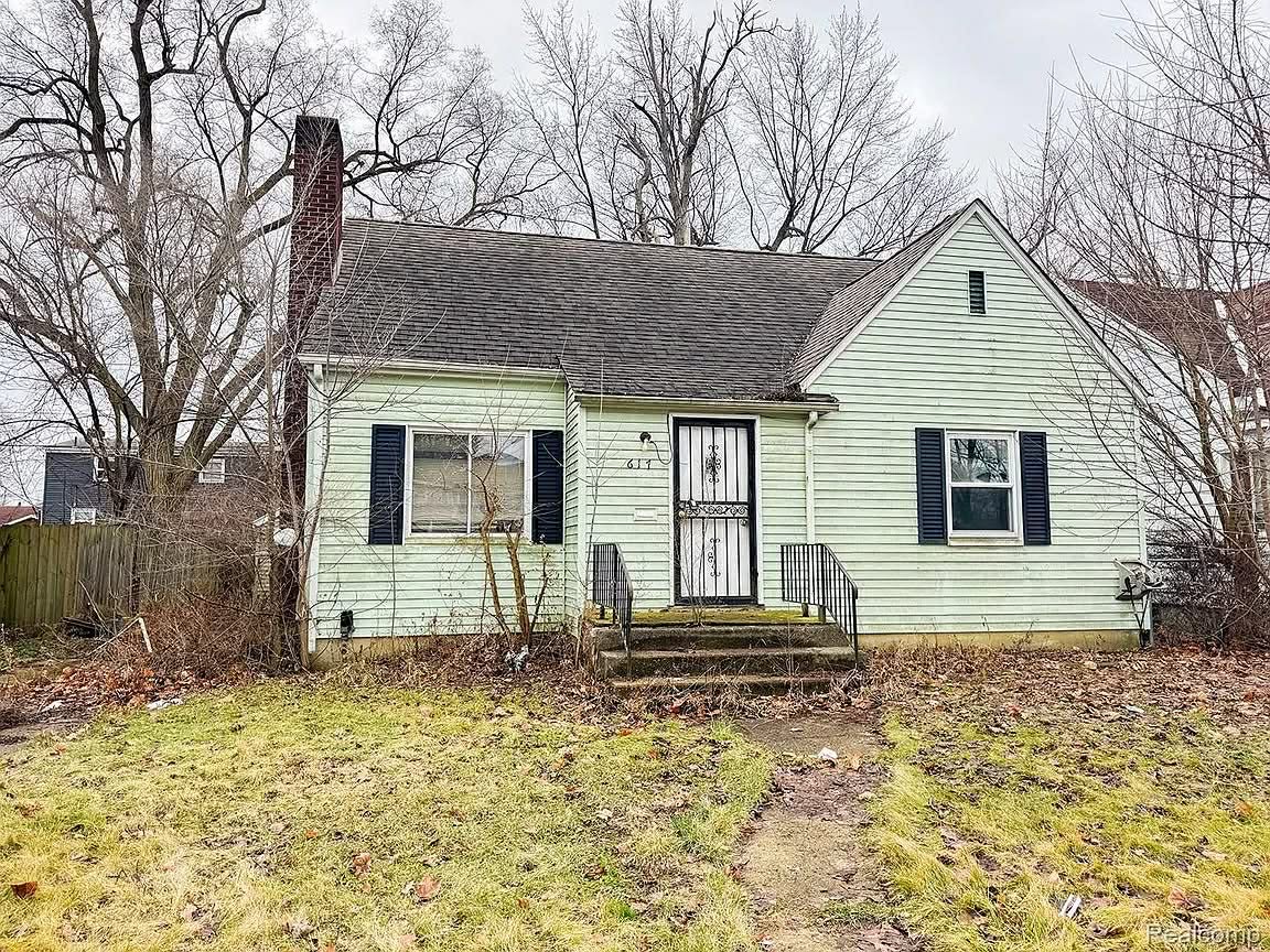 Three-Bedroom Fixer-Upper with Fireplace and Detached Garage
