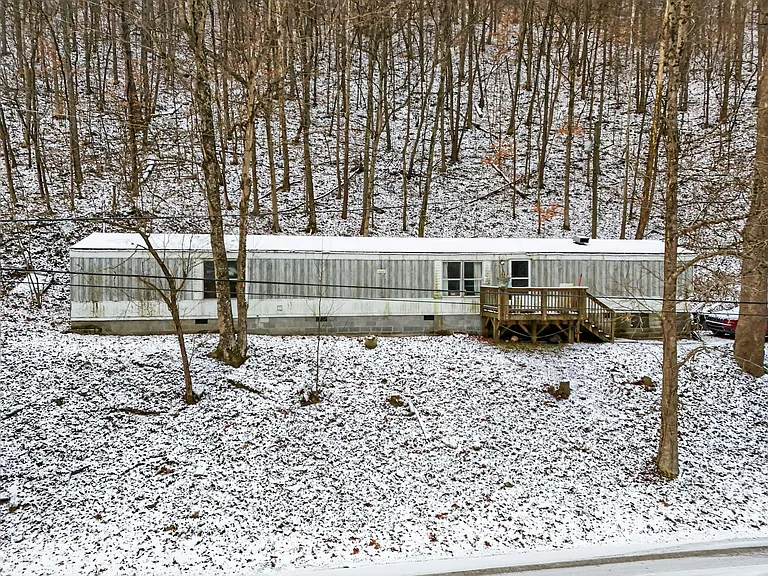 Mountain Living in Hazard Kentucky with Private Land and Endless Potential
