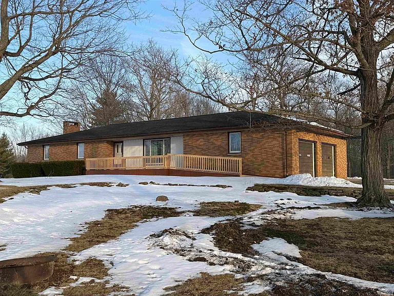 Peaceful Country Brick Ranch with Spacious Interior and Scenic Rural Surroundings in Churubusco, Indiana