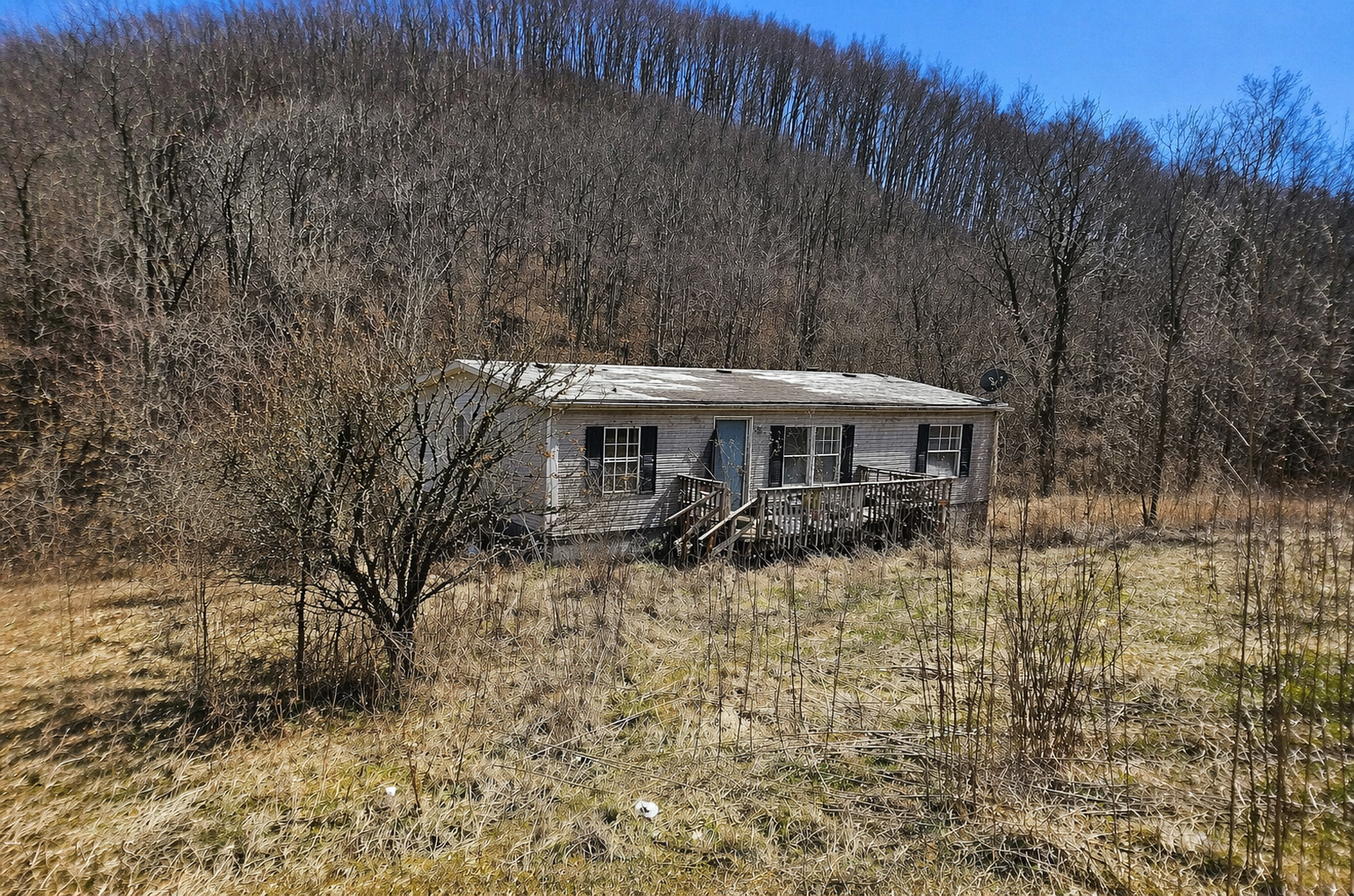 Secluded Creekside Fixer-Upper on Expansive Land in North Tazewell