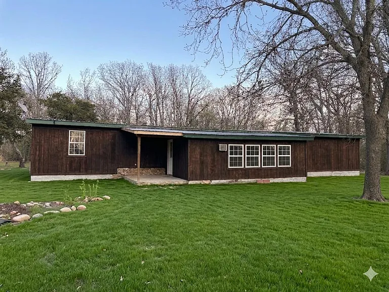 Rural Home with Usable Land and Outbuildings in Cassville