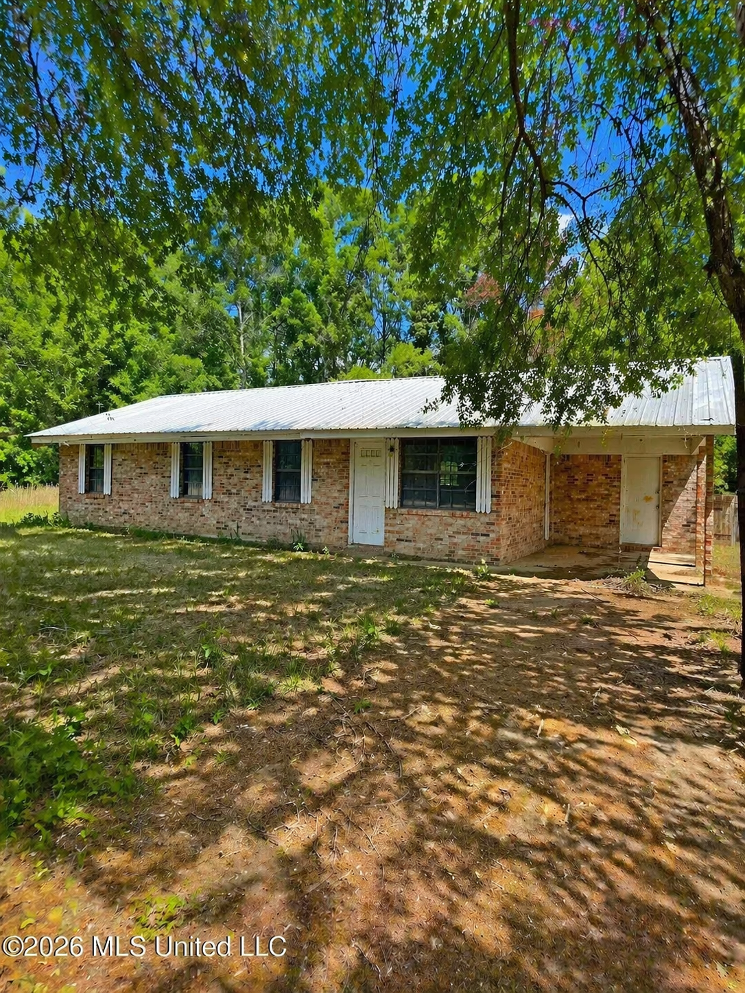 Brick Home in Collinsville, Mississippi with Privacy and Investment Potential