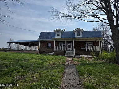 Classic Sweetwater Fixer-Upper with Restoration Potential