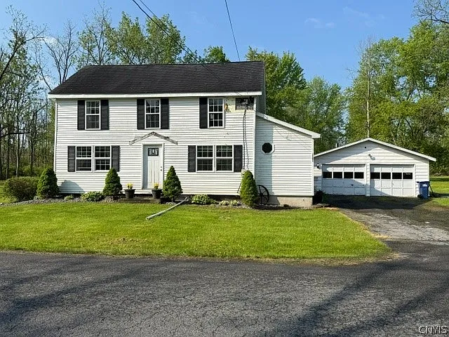 Charming Oneida Home With Space, Character, and Great Potential