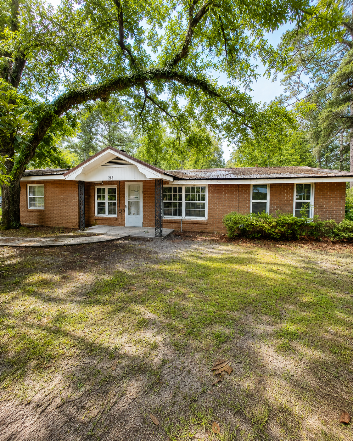 Small-Town Georgia Home with Fireplace, Spacious Lot, and Investment Potential
