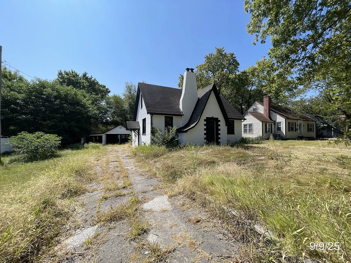 Charming Tudor-Style Cape Cod Home With Updates, Deep Lot, And Garage In Belleville