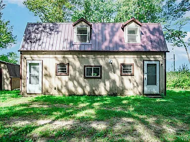 Mayville Property With Privacy, Outdoor Space, and Great Potential